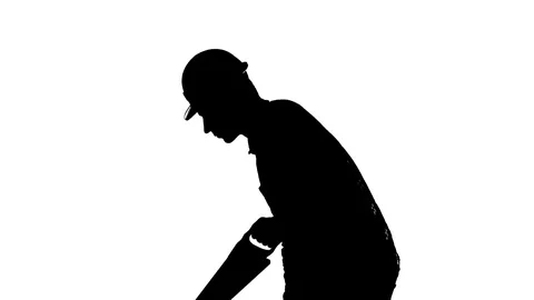 Worker with a hand saw cuts the frame at the bottom Video stock 74075522