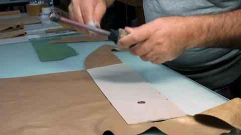 Worker Hands Cutting Green Leather izmir, turkey, 5 october 2025 Stock Footage 322057716