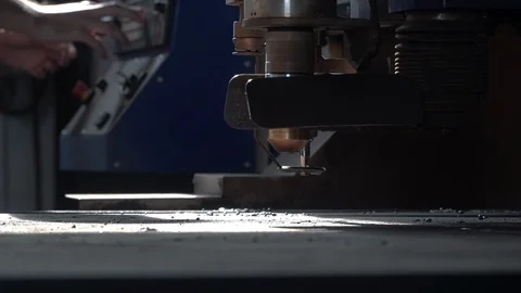 Worker hands direct CNC plasma machine to metal close view Stock Footage 118522928