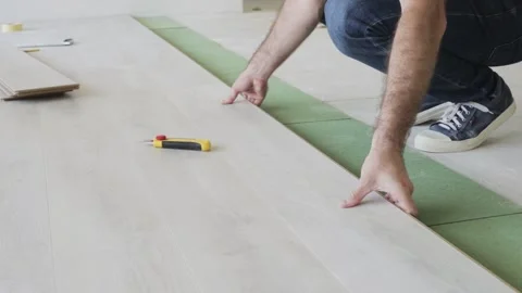 A worker hands knocking on a laminate connecting 動画素材 147172994