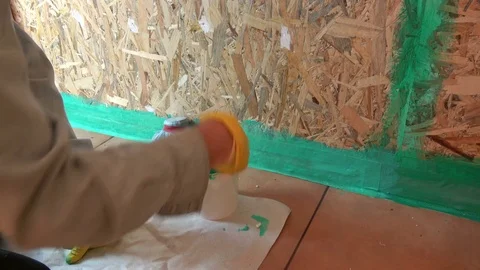 Worker hands with paintbrush waterproofing  bathroom construction Video stock 77152359