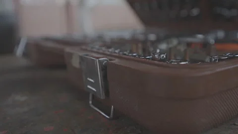 Worker hands in textile gloves open suitcase with tool with set of wrenches Stock Footage 260549601