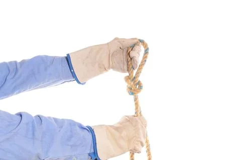 Worker hands tying a splice knot, isolated on white background. Wearing safety Stock Photos