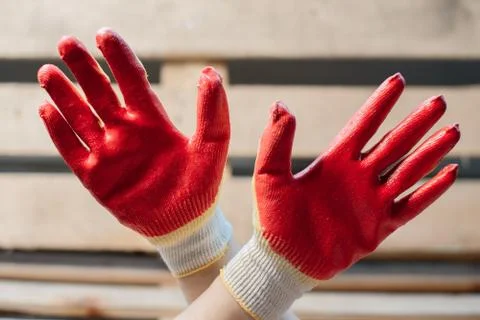 Worker hands Wearing Leather Work Glove Giving the Thumbs Up Sign Stock Photos