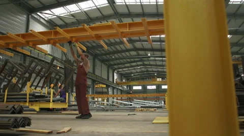 Worker hangs metal corner Stock Footage 34830425