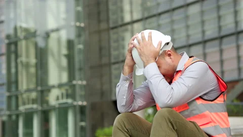 Worker hard working at construction site he tired and disconsolate. The civil en Stock Footage 162293488
