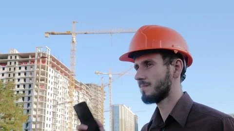Worker in helmet Stockbeeldmateriaal 95217727