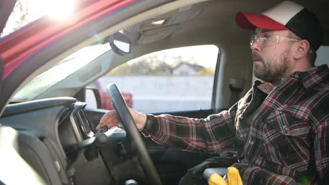 Worker in His 30s Fitting Himself Inside Brand New Pickup Truck Stock Footage 166657913