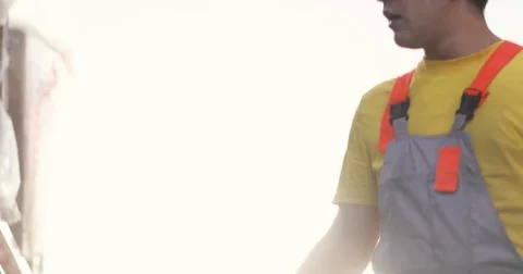 Worker holding checklist and scanning products Stock Footage 84881201