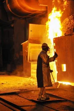 Worker with hot steel Stock Photos