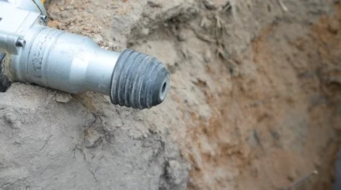 Worker inserting a core drill bit into perforator Stock Footage 68324387