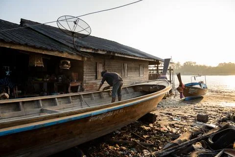 Worker Inside Longtail Boat at Krabi Workshop Stock Photos