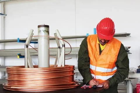 Worker inspect copper wire Stock Photos