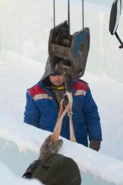 Worker on the installation of an ice panel Fotos Stock
