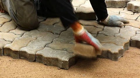 Worker installing old cobblestone block for build floor ground (Time Lapse) Stock Footage 42622124