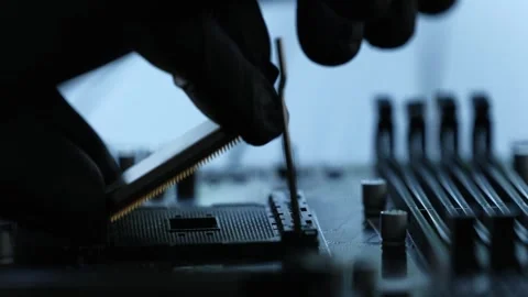 Worker Installing Processor Chip On Motherboard Stock Footage 315685659