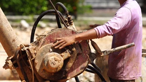 Worker installing wet-process bored pile Stock Footage 87025141