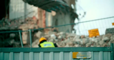 Worker installing a Wire fence, Installation of barbed wire, Steel wire Stock Footage 144649057