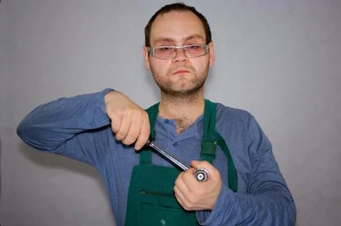 Worker with instruments in palm Stock Photos