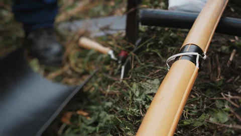 A worker insulates a joint between two plastic pipes. Stock Footage 318268163