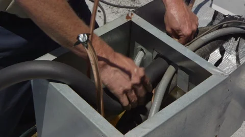 Worker Insulating Pipe HVAC Stock Footage 64053548