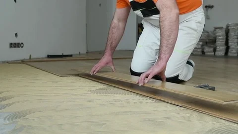 Worker joining parket floor. slow motion Stock Footage 85071568