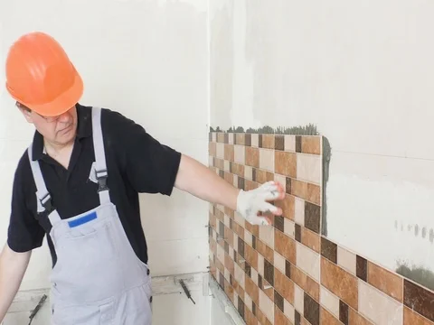 The worker is knocking a rubber hammer. Stock Footage 79249711
