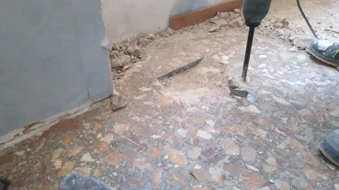 Worker knocks down marble with a jackhammer Stock Footage 152335634