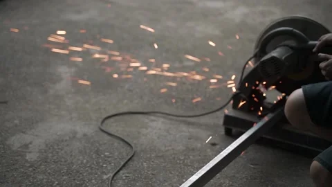 Worker labor cutting steel using sawing machine Video stock 134931575