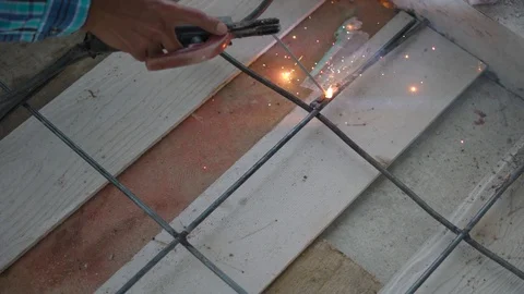 Worker labor welding wire metal for building Video stock 89617807
