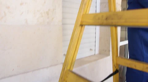 Worker on ladder Stock Footage 33662220