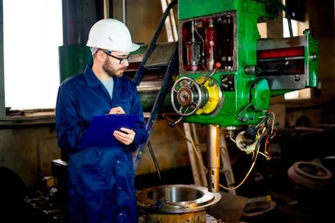 Worker with lathe Stock Photos
