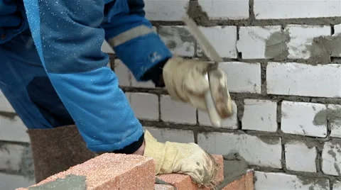 Worker laying brick wall Stock Footage 65286270