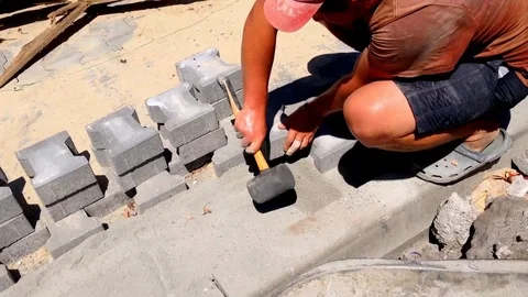 Worker laying decorative paving slab Video stock 112198620