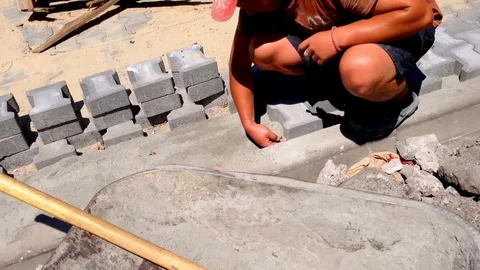 Worker laying Stone Paving Slab mosaic close-up. Stock-Footage 112198596
