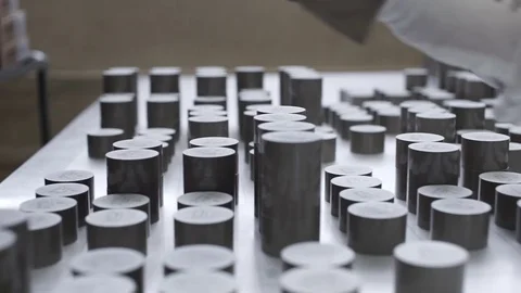 Worker lays varistors on a special table Stock Footage 71506812