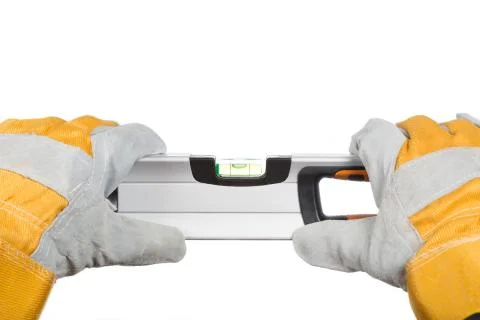 Worker with a level Stock Photos