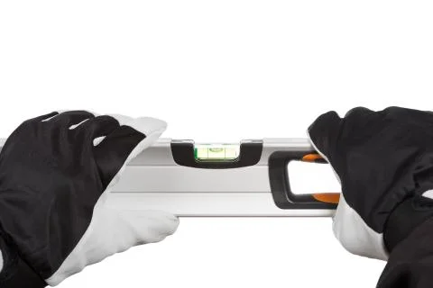 Worker with a level Stock Photos