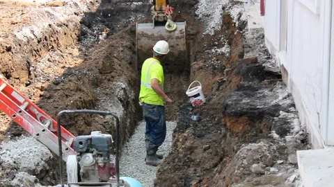 Worker leveling Base Rock Stock Footage 103238407