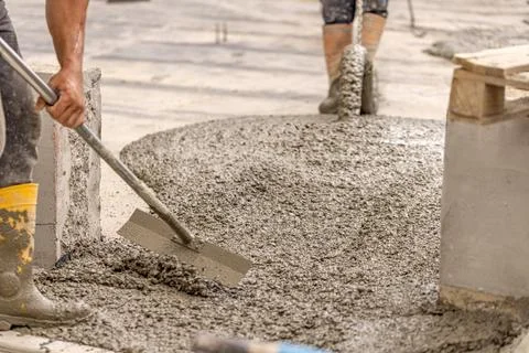 Worker leveling concrete Stock Photos