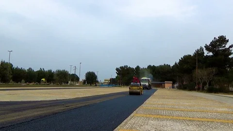Worker on light Vibration roller compactor at road construction 動画素材 91898353