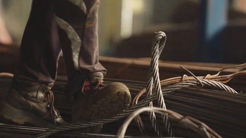 Worker loading rebar and hanging the load on the crane's chains Video stock 120821785