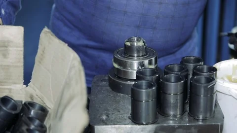 Worker lubricates part for automobile Video stock 111247262