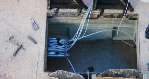 Worker made a break-in with an electric demolition hammer in the reinforced c Stock-Footage 156889311