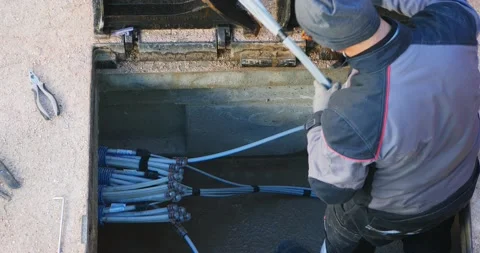 Worker made a break-in with an electric demolition hammer in the reinforced c Stock-Footage 156889440