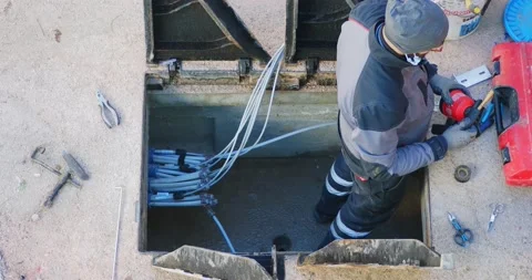 Worker made a break-in with an electric demolition hammer in the reinforced c Video stock 156889451