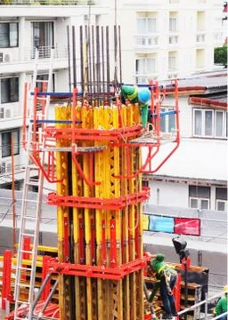Worker make big pole on high construction area with seafty set for high build Stock Photos