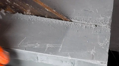 Worker makes an apartment repair, cuts plates Stock Footage 114895447