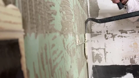 The worker makes the dismanting of the ceramic tiles. Repair work Stock-Footage 164170703