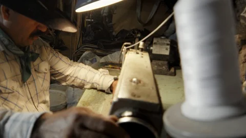 Worker Makes Seams On Leather Material Stock Footage 98764460